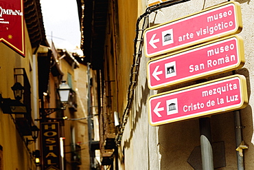 Directional signboards on a pole, Toledo, Spain