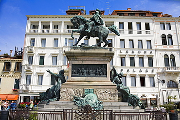 Low angle view of statues in front of a building, Vittorio Emanuele II Statue, Riva Degli Schiavoni, Venice, Italy