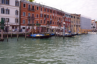 Boat docked in a canal in front of buildings, Grand Canal, Venice, Italy