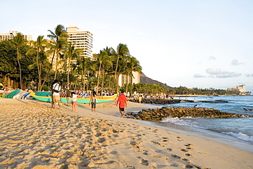 Tourists on the beach, Waikiki Beach, Honolulu, Oahu, Hawaii Islands, USA