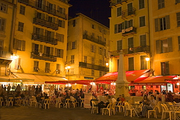 Group of people sitting at a sidewalk cafe, Nice, France