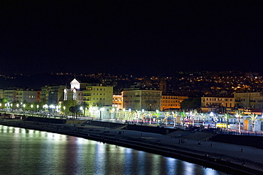 Reflection of street lights in water, Promenade des Anglais, Nice, France