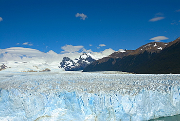 Glacier in a lake with mountains in the background, Moreno Glacier, Argentine Glaciers National Park, Lake Argentino, El Calafate, Patagonia, Argentina