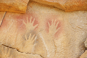 Hand signs on a rock, Cave of the Hands, Pinturas River, Patagonia, Argentina