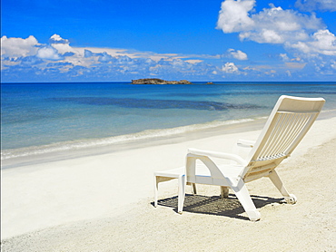 Empty lounge chair on the beach, South West Bay, Providencia, Providencia y Santa Catalina, San Andres y Providencia Department, Colombia