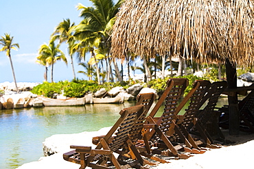 Deck chairs on the beach, Cancun, Mexico