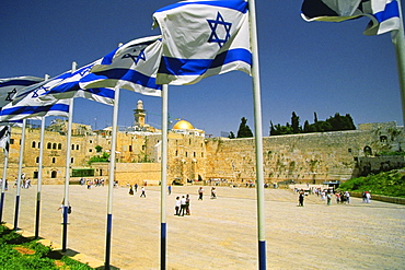 Israeli flags at a shrine and a dome in the background, Wailing Wall, Dome Of The Rock, Jerusalem, Israel