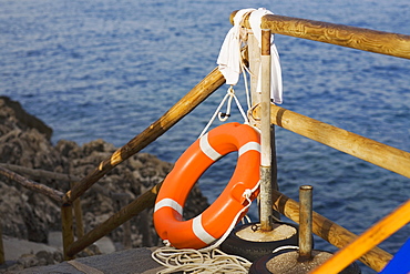 Life belt near a wooden railing, Capri, Campania, Italy