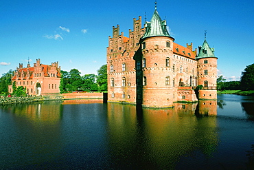 Reflection of a castle in water, Egeskov Castle, Funen County, Denmark