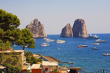 Boats in the sea, Faraglioni Rocks, Capri, Campania, Italy