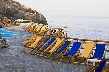 Deck chairs in a row, Capri, Campania, Italy