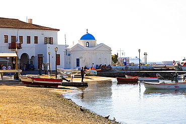 Boats in front of a church, Mykonos, Cyclades Islands, Greece