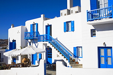 Sidewalk cafe in front of a building, Mykonos, Cyclades Islands, Greece