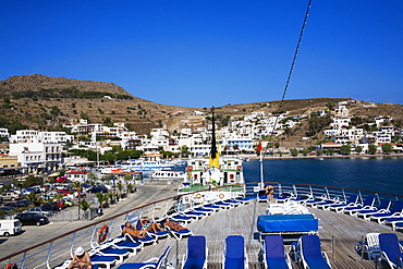 High angle view of lounge chairs on the deck of a ship, Skala, Patmos, Dodecanese Islands, Greece