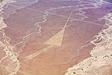 Aerial view of nazca lines representing a triangle in a desert, Nazca, Peru