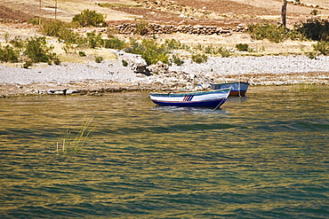 Boats in a lake, Lake Titicaca, Puno, Puno Region, Puno Province, Peru