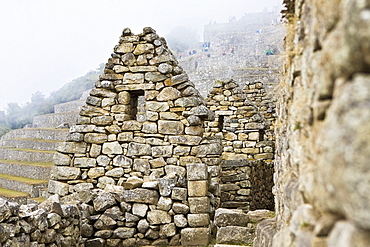 Old ruins of stone structures, Machu Picchu, Cusco Region, Peru