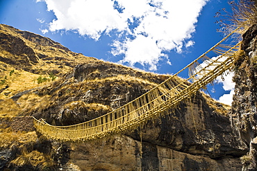 Low angle view of a rope bridge across a mountain, Queswachaca, Peru