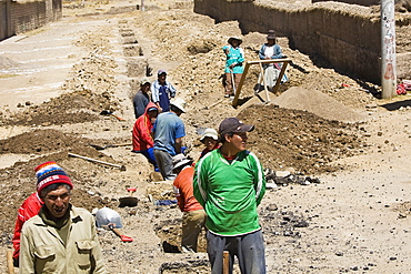 High angle view of a group of people digging a road, Puno, Cuzco, Peru