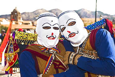 Portrait of two people wearing traditional costumes, Cuzco, Peru