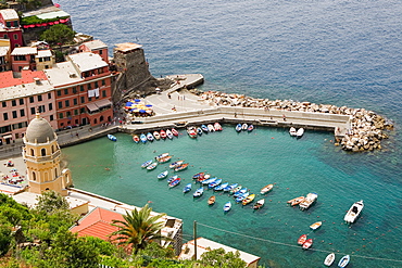 High angle view of boats in the sea, Church of Santa Margherita d'Antiochia, Doria Castle, Italian Riviera, Cinque Terre National Park, Vernazza, La Spezia, Liguria, Italy