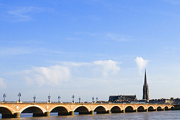 Arch bridge across a river, Pont De Pierre, St. Michel Basilica, Garonne River, Bordeaux, Aquitaine, France