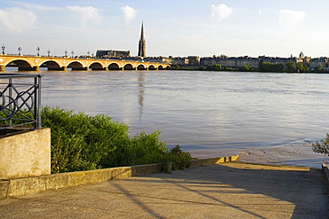 Arch bridge across a river, Pont De Pierre, St. Michel Basilica, Garonne River, Bordeaux, Aquitaine, France