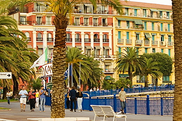 Group of people walking in front of a hotel, Quai Des Etats- Unis, Nice, Provence-Alpes-Cote D'Azur, France