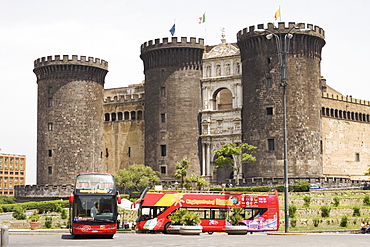 Buses in front of a castle, Castel Nuovo, Naples, Naples Province, Campania, Italy