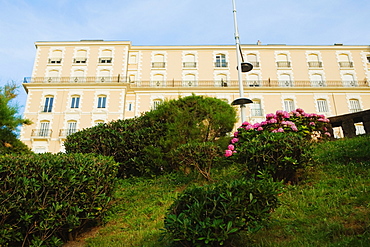 Low angle view of a formal garden in front of a building, Biarritz, Basque Country, Pyrenees-Atlantiques, Aquitaine, France