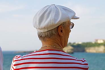 Rear view of a mature woman, Baie De Biarritz, Biarritz, Pyrenees-Atlantiques, France