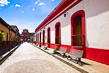 Buildings on both sides of a street, San Cristobal De Las Casas, Chiapas, Mexico