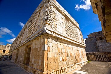 Low angle view of old ruins of a building, Cuadrangulo De los Pajaros, Uxmal, Yucatan, Mexico