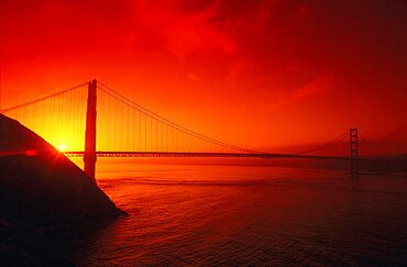 Silhouette of a suspension bridge at dusk, Golden Gate Bridge, San Francisco, California, USA