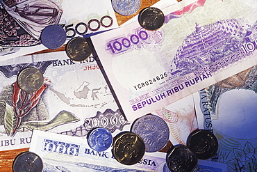 Close-up of Euro cent coins on Euro banknotes