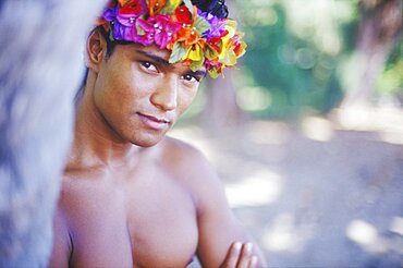 Portrait of a young man smiling, Hawaii, USA