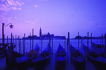 Boats moored at a dock, Italy