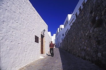 Man walking in an alley