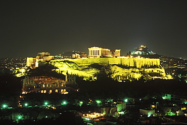 High angle view of buildings in a city lit up at night, Parthenon, Athens, Greece