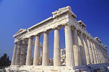 Low angle view of old ruin colonnades, Parthenon, Athens, Greece