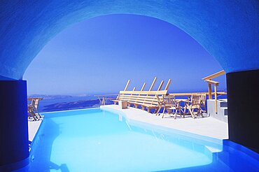 Chairs and tables at the poolside