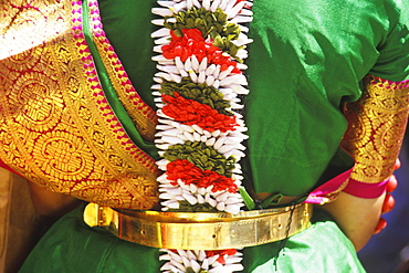 Mid section view of a stage performer, Bali, Indonesia