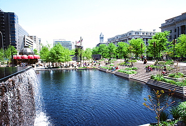 Man made pond with buildings in the background, Washington DC, USA