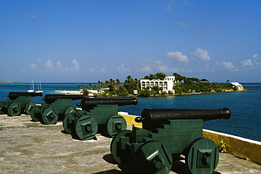 View of cannons with a fort seen in the background, Christiansvaern fort, St. Croix, U.S. Virgin Islands