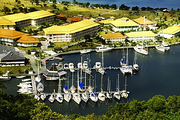 A fleet of ships anchored at a harbor, St. Maarten, Caribbean.