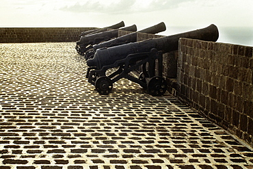 A series of cannons on an old and historic fort, St. Kitts, Leeward Islands, Caribbean