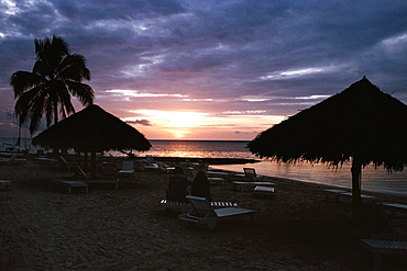 A thatched canopy is seen at Negril Beach, Jamaica