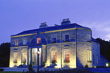 Building lit up at night, St. Clerens, Galway, Republic of Ireland