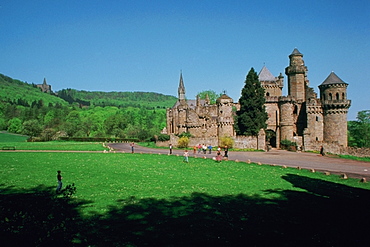 People in front of a castle, Snow-white Castle, Kassel, Germany