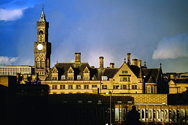 Front view of a clock tower on a cloudy day, Bradford, England